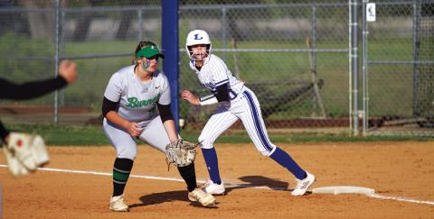 Saegan Plouff gets a lead off first base during the Lady Badgers’ win over Burnet on Wednesday. HUNTER KING | DISPATCH RECORD