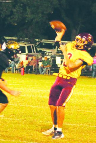 Jordan Livesay attempts a pass while avoiding the rush against Jonesboro. MASON HINES | DISPATCH RECORD