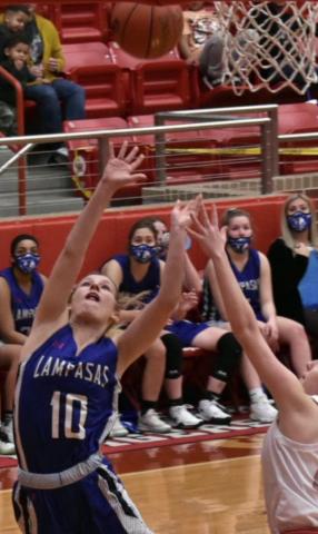 Bre Quarles shoots over a Lady Tiger defender. MICHELLE QUARLES | COURTESY PHOTO