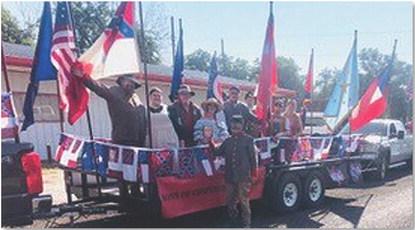 The Sons of Confederate Veterans participated in the DeLeon Peach and Melon Festival &amp; Parade, where members handed out candy and shared their Southern heritage with the crowd. The SCV float also took third place in the parade. courtesy photo