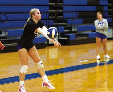 HUNTER KING | DISPATCH RECORD Scout Barton works on serve receive during volleyball practice Monday morning.