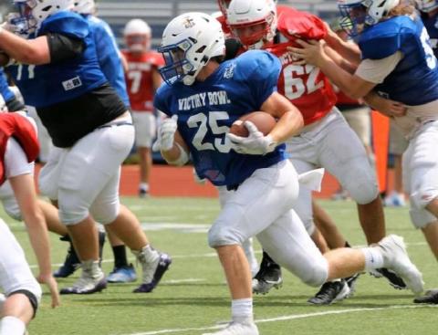 Badger grads play together one last time on gridiron