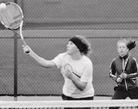 Abby Valdez, right, earned first-team all-district in tennis singles, and second-team in doubles, with Kailr Clements, shown hitting the ball. JEFF LOWE | DISPATCH RECORD