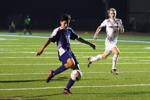 HUNTER KING | DISPATCH RECORD Edwin Alvarado Gomez takes a shot on goal during the second half of Tuesday’s match against China Spring.