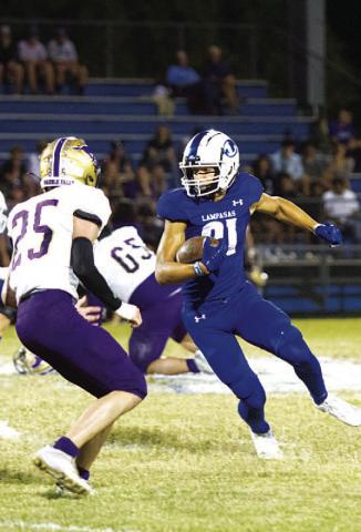 HUNTER KING | DISPATCH RECORD Ty Johnson scored two receiving touchdowns for the Badgers last Friday.