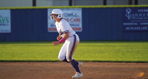 Kamryn Kothmann takes her lead off second base after a first-inning single against Burnet. HUNTER KING | DISPATCH RECORD