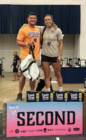 Astin Murray, left, and Natalee Johnson smile on the podium. COURTESY PHOTO