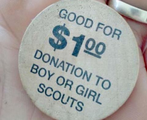 Gina Garner found 672 wooden tokens redeemable for a donation from the Hoffpauir Auto Group to the Boy Scouts or Girl Scouts. COURTESY PHOTO