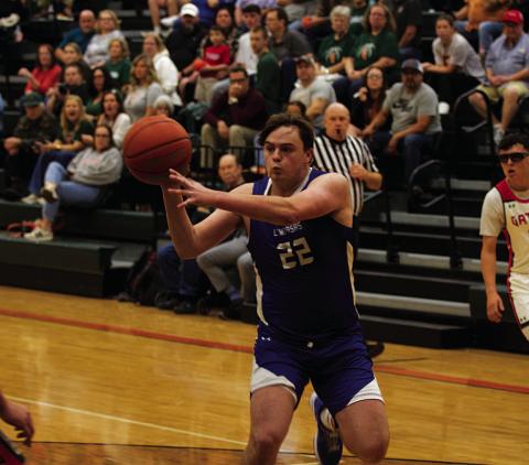HUNTER KING | DISPATCH RECORD Sam Williams makes a pass to a teammate during Tuesday’s game against Gateway.