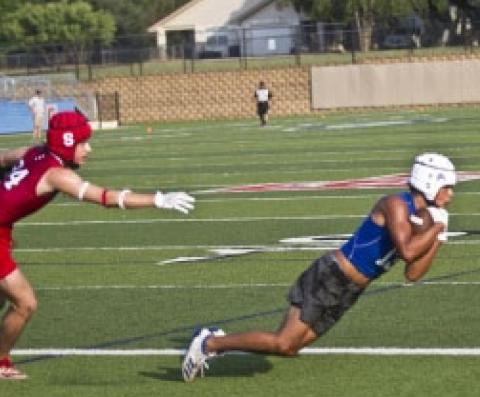 Jose Parra dives to haul in a Dax Brookreson touchdown pass at the end of the Badgers’ 7-on-7 game against Salado on Monday. JEFF LOWE | DISPATCH RECORD