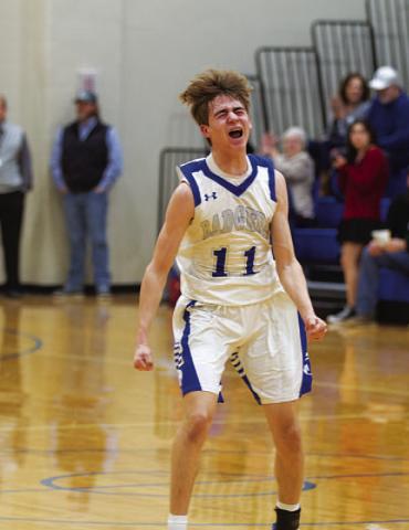 Jax Pratus screams in celebration as the final buzzer sounds. HUNTER KING | DISPATCH RECORD