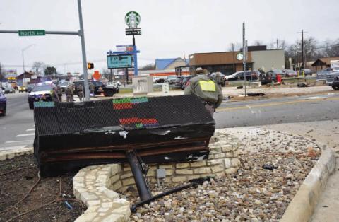 DISPATCH RECORD This electronic sign at First Texas Bank’s motor facility was flattened by a southbound vehicle Sunday afternoon as the vehicle was being pursued by a Texas Department of Public Safety trooper. The driver fleeing from the DPS did not survive the crash at Key and North avenues.