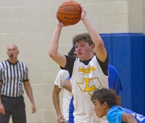 Braden Ramirez prepares to pass the ball for Lometa in a game against Priddy on Thursday. JEFF LOWE | DISPATCH RECORD