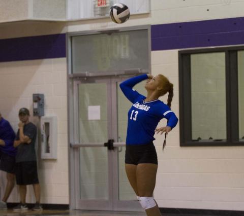 Juliana Dwamena goes up for a serve during a match in Florence earlier this season. Dwamena has been one of the team leaders in both kills and blocks this season. HUNTER KING | DISPATCH RECORD