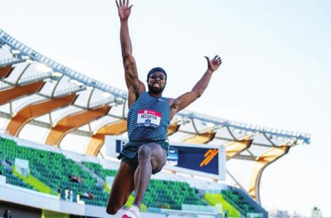 Steffin McCarter leaps through the air during the world championship qualifiers event last week. COURTESY PHOTO | TEXAS ATHLETICS