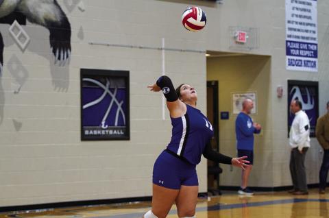 Julia Ybarra swings through a serve during a recent match at home. HUNTER KING | DISPATCH RECORD