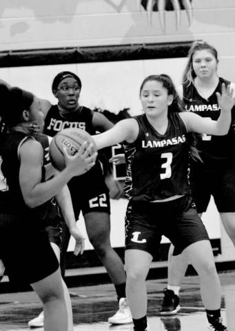 Kharis Castañeda (3) guards an opposing player in the Lady Badgers’ home basketball scrimmage on Tuesday. JEFF LOWE | DISPATCH RECORD