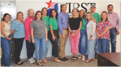 First Texas Bank has continued its support of the Spring Ho Festival by making a contribution toward the signature, weeklong event that commences next week in Lampasas. Shown here, from left to right, are several Spring Ho Committee members with bank employees Blanca Rathbun, Jennifer Wiley, Ladonna Bishop, Brittany Whitcomb, Megan Tabor, Stacy Oncken, Kelvin Barkowsky, Annie Trotter, Shane Wilson, Torie Palmer, Nick Myers, Taylor Payne and Lee Loeffler. hunter king | dispatch record
