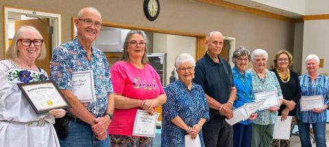 Lampasas County Retired Teachers Association held its last meeting of the school year May 5. Members received certificates of appreciation for their committee and advocacy work throughout the year. Pictured are, from left, Julia Phillips, Trent Lancaster, Debbie Irvine, Sandy Brister, TP Wingo, Charlene Ruzicka, Margaret Oberender, Jani Edwards and Janet Machen. COURTESY PHOTO