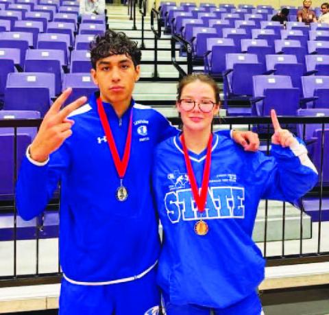 COURTESY PHOTO Kaiden Fernandez, left, and Jordan Winfree pose with their medals from the first tournament.