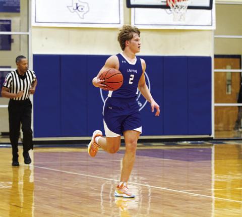 Haegan Oncken dribbles up the floor during the Badgers’ game against Jarrell. HUNTER KING | DISPATCH RECORD