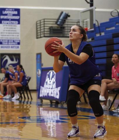 Payton Crawford lines up a three pointer during Monday’s summer league game against Burnet. The Lady Badgers captured a convincing 50-17 victory. ERICK MITCHELL | DISPATCH RECORD