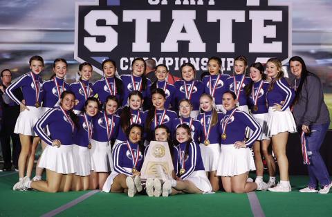 The cheer team poses with their trophy and medals after finishing third at the state competition in Fort Worth. COURTESY PHOTO