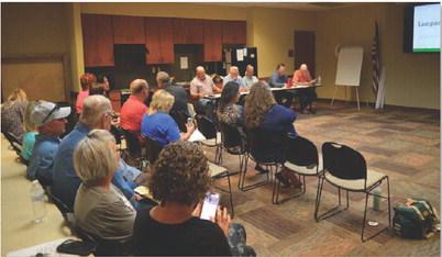 Residents await the opening of Wednesday’s public hearings on the 2023-2024 county tax rate and budget. ERICK MITCHELL | DISPATCH RECORD