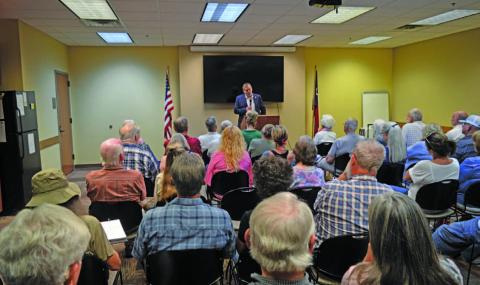 A standing-room-only audience filled the conference room at the Lampasas County Office Building Thursday evening to hear District 68 State Rep. David Spiller describe action taken during the recently completed regular legislative session. ERICK MITCHELL | DISPATCH RECORD