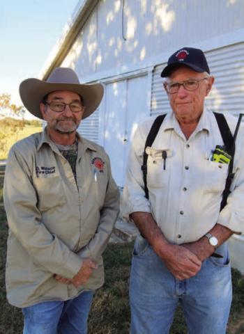 Adamsville Volunteer Fire Chief Dean Watson and Larry Straley, left to right, pose for a photo at the 55th Annual Deer Hunter’s Bar-B-Que on Saturday. JOYCESARAH MCCABE | DISPATCH RECORD