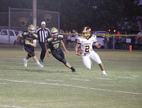 Tim Juarez runs past Abbott defenders during the game last Friday. JESSICA MALDONADO | DISPATCH RECORD