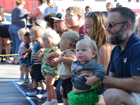 ALEXANDRIA RANDOLPH | DISPATCH RECORD Toddler handlers line up their 16- to 19-month-old race contestants during the annual Spring Ho Diaper Derby on Friday. Results can be found below.