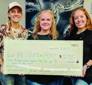 COURTESY PHOTO Folded Owl founder Lacey Schwab, at right, stands alongside Amber Slatton, who received donations from the Hunting4Hope event last year to help her son Cole battle cancer.