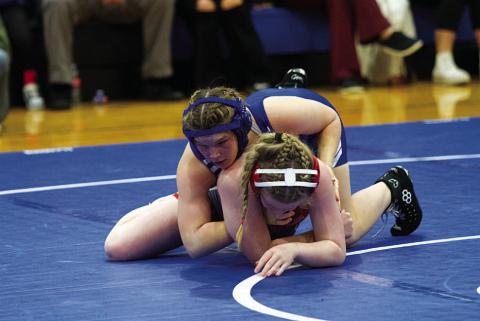 Taylor Martell and her team are wrestling at the THSWCA State Duals. The district wrestling meet will be held Jan. 29 at Burleson High School. HUNTER KING | DISPATCH RECORD