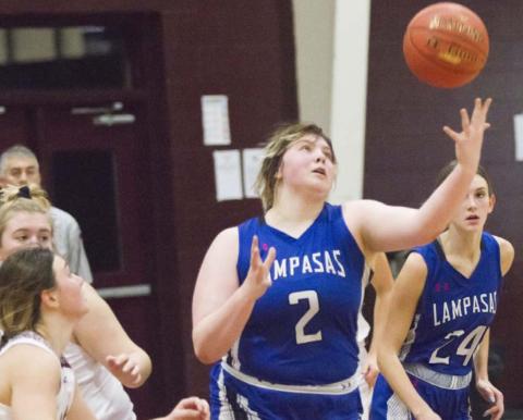 Morgan Lovejoy (2) reaches for control of the ball in Friday’s district road game against Brownwood. JEFF LOWE | DISPATCH RECORD