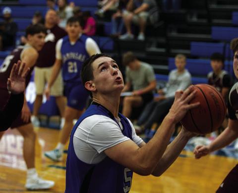 HUNTER KING | DISPATCH RECORD JT Posten looks to go up for a layup during one of the Badgers’ scrimmages last Saturday.