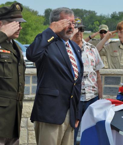 Gene Isenhour salutes during Kempner’s recent Memorial Day observance in honor of those servicemembers who died in the line of duty. erick mitchell | dispatch record