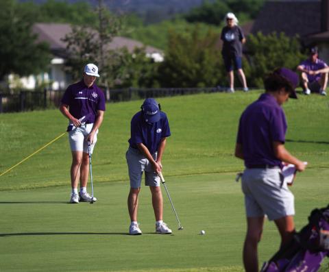 HUNTER KING | DISPATCH RECORD Peyton Spore makes a birdie putt during his second round of the state tournament.