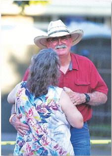 Stoney Holbrook dances with Teresa Holbrook on the street of the downtown square during last week’s dance. hunter king | Dispatch RecordE
