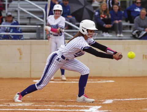 Kayli Syx lays down a perfect bunt for the Lady Badgers. The senior uses her speed as a weapon. HUNTER KING | DISPATCH RECORD
