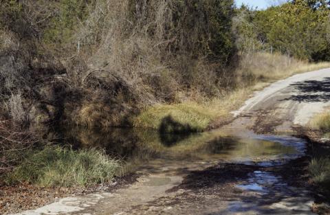 This low-water crossing is in need of repairs along County Road 2207 at Lucy Creek and will be funded by FEMA. ERICK MITCHELL | DISPATCH RECORD