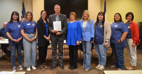 Lampasas Child Protective Services board members and Hill Country Children’s Advocacy Center staff pose for a photo with County Judge Randy Hoyer, who holds a proclamation in support of April’s designation as Child Abuse Prevention Month. ERICK MITCHELL | DISPATCH RECORD