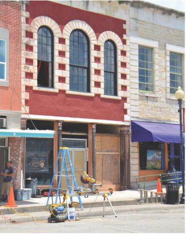 Stripping away brick on the facade of 513 E Third Street revealed ornate steel columns that have been in place for at least 100 years. Owner and renovator Travis Redding hopes to restore the building to its 1870s era glory. ALEXANDRIA RANDOLPH | DISPATCH RECORD