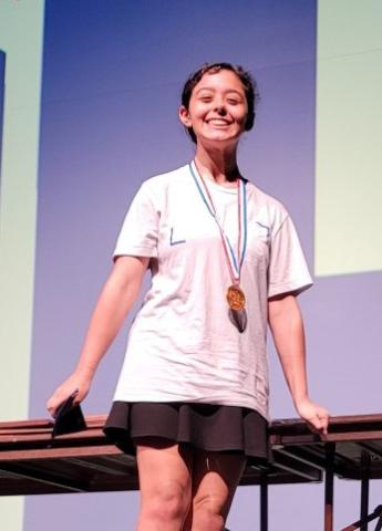 Juliet Cardona displays the medal she received at the UIL State Academic Meet. Cardona took sixth in copy editing. courtesy photo