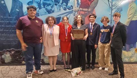 Pictured left to right are speech and debate competitors Lamar Linton, Sholee Turner, Jewel Groves, coach Cheri Jay-Wienecke, Bao Nguyen, Liberty Potts and Wyatt Potts. COURTESY PHOTO