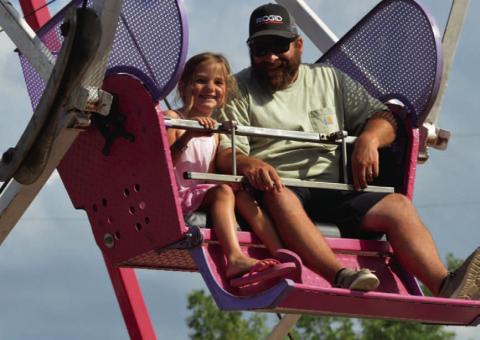 Rides like the ferris wheel bring a bit of nostalgia to the Spring Ho Festival. FILE PHOTO