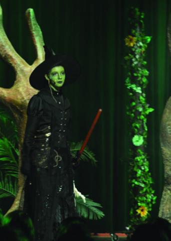 Maylee Harbin stars as the Wicked Witch in LHS’s rendition of “The Wizard of Oz.” ERICK MITCHELL | DISPATCH RECORD