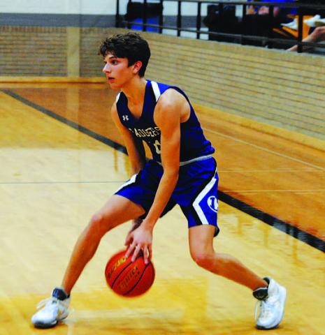 Luke Shivers dribbles in isolation before attacking the basket. HUNTER KING | DISPATCH RECORD