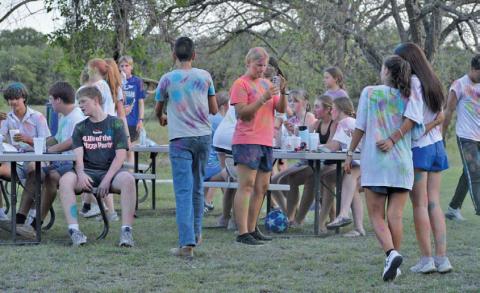 Lampasas Young Life members enjoyed fellowship time after Monday’s paint wars activity. erick mitchell | dispatch Record