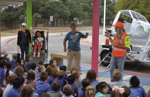 Lampasas County resident and child passenger safety technician Paul Miceli talks with Hanna Springs Elementary School students earlier this school year about the importance of car seat safety. COURTESY PHOTO